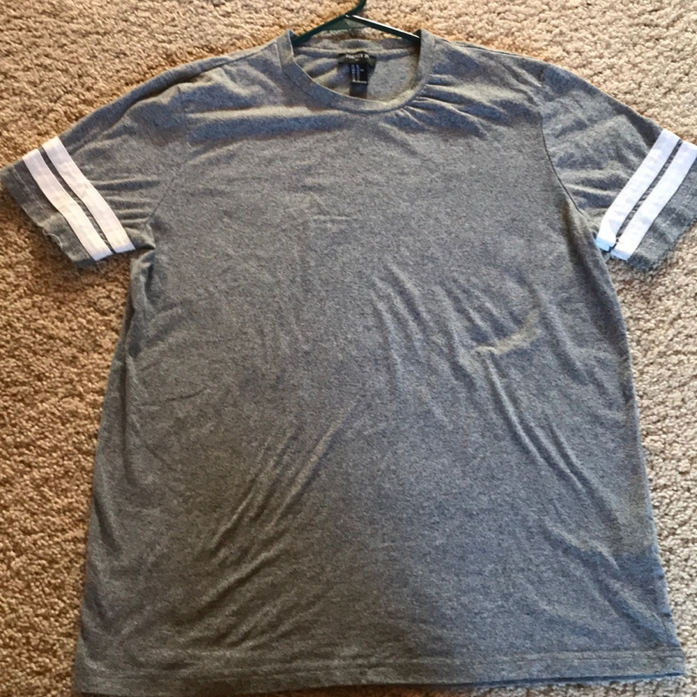 Gray shirt with white stripes on sleeves